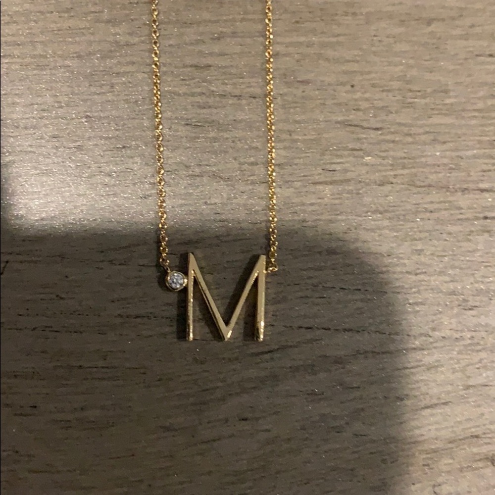 NWT Anthropologie Monogram “M” necklace in gold.